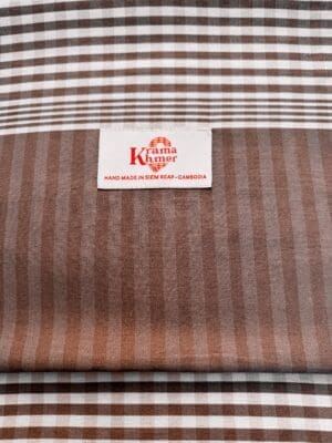 Brown striped fabric with label